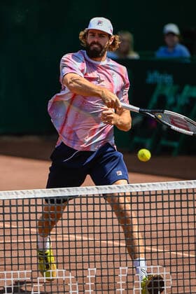 HOUSTON, TX - APRIL 08: Reilly Opelka (USA) hits an overhead during the US Clay Court Championships quarterfinal singles match at River Oaks Country Club on April 8, 2022 in Houston, TX. (Photo by Ken Murray Icon Sportswire) TENNIS: APR 08 U.S. Men™s Clay Court Championship Icon220408024