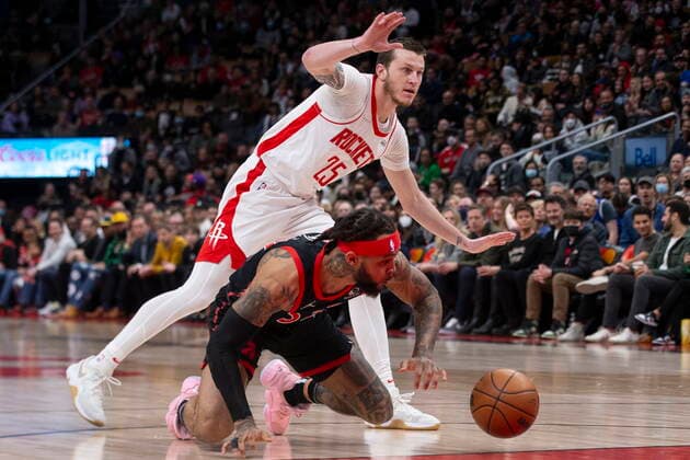 April 8, 2022, Toronto, ON, CAN: Toronto Raptors Gary Trent Jr. (bottom) battles for the ball with Houston Rockets Garrison Mathews during first half NBA, Basketball Herren, USA basketball action in Toronto on Friday, April 8, 2022. Gary Trent Jr. ; Garrison Mathews  - ZUMAc35_ 20220408_zaf_c35_085 Copyright: xChrisxYoungx