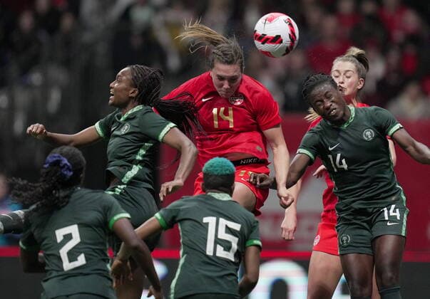 April 8, 2022, VANCOUVER, BC, CANADA: Canada s Vanessa Gilles, centre, vies for the ball against Nigeria s Ifeoma Onumonu, left, and Christy Ucheibe, right, during the second half of a women s friendly soccer match, in Vancouver, on Friday, April 8, 2022. Canada News - April 8, 2022 - ZUMAc35_ 20220408_zaf_c35_211 Copyright: xDarrylxDyckx