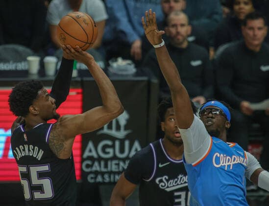 Josh Jackson 55 of the Sacramento Kings shoots a shot guarded by Reggie Jackson 1 of the LA Clippers at Crypto.com Arena in Los Angeles, CA on Saturday, April 9, 2022. Los Angeles Clippers vs Sacramento Kings !ACHTUNG: NUR REDAKTIONELLE NUTZUNG!  Copyright: xPHILLIPxKIMx AME133 20220410-19af63a0f5f9c510b31cfaac05fc9f11f76f2acf