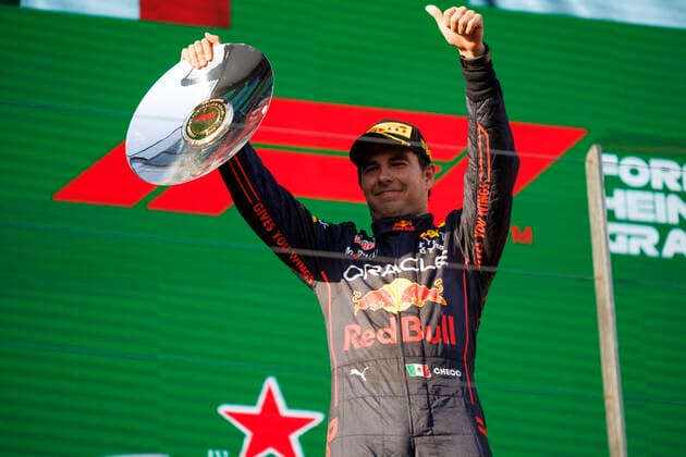 10th April 2022, Albert Park, Melbourne, Australia; FIA Formula 1 Australian Grand Prix, Race Day: Red Bull driver Sergio Perez on the podium is second in the race at the Australian Formula 1 Grandprix  ActionPlus12378085 StephenxBlackberry