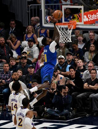 Denver Nuggets forward JaMychal Green (up) goes in for the basket against the Denver Nuggets, during a NBA, Basketball Herren, USA game at the Ball Arena in Denver, CO, USA, 10 April 2022. Denver Nuggets - Los Angeles Lakers !ACHTUNG: NUR REDAKTIONELLE NUTZUNG!  Copyright: xToddxPiersonx AME471 20220411-32a1e0200d8d57917c864652775f5e123f9acdd9