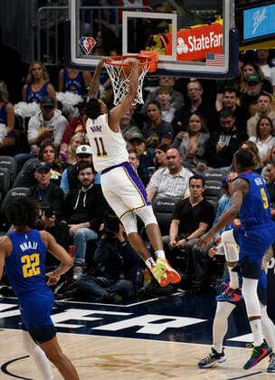 Los Angeles Lakers guard Malik Monk (up) goes in for the dunk against the Denver Nuggets, during a NBA, Basketball Herren, USA game at the Ball Arena in Denver, CO, USA, 10 April 2022. Denver Nuggets - Los Angeles Lakers !ACHTUNG: NUR REDAKTIONELLE NUTZUNG!  Copyright: xToddxPiersonx AME495 20220411-98fb8f6fe0e49536335946258491339422b8bd92