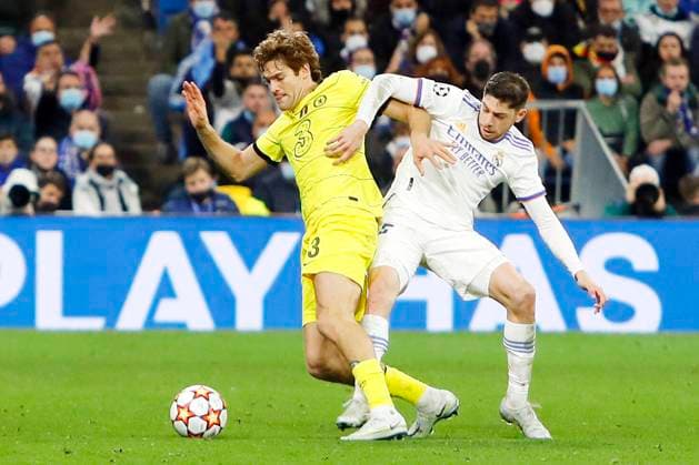 April 12, 2022, Madrid, Spain: Marcos Alonso of Chelsea FC in action with Federico Valverde of Real Madrid during the UEFA Champions League Quarter Final Leg Two match between Real Madrid and Chelsea FC at Estadio Santiago Bernabeu on April 12, 2022 in Madrid, Spain. Madrid Spain - ZUMAd159 20220412_zia_d159_060 Copyright: xApoxCaballerox