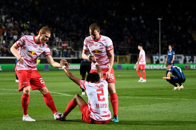 Atalanta BC v RB Leipzig - UEFA Europa League Marcel Halstenberg, Mohamed Simakan and Lukas Klostermann of RB Leipzig celebrate at the end of the UEFA Europa League quarter final second leg football match between Atalanta BC and RB Leipzig. Bergamo Italy Copyright: xNicolòxCampox