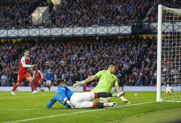 Mandatory Credit: Photo by Stuart Wallace Shutterstock (12893325r) Rangers Captain James Tavernier shoots past SC Braga goalkeeper Matheus to score and give Rangers a 1-0 lead (agg. 1-1). Rangers v Braga, UEFA Europa League, Quarter Final, Second Leg, Football, Ibrox Stadium, Glasgow, UK - 14 Apr 2022 EDITORIAL USE ONLY No use with unauthorised audio, video, data, fixture lists, club league logos or live services. Online in-match use limited to 120 images, no video emulation. No use in betting, games or single club league player publications. Rangers v Braga, UEFA Europa League, Quarter Final, Second Leg, Football, Ibrox Stadium, Glasgow, UK - 14 Apr 2022 EDITORIAL USE ONLY No use with unauthorised audio, video, data, fixture lists, club league logos or live services. Online in-match use limited to 120 images, no video emulation. No use in betting, games or single club league player publications. Copyright: xStuartxWallace Shutterstockx 12893325r