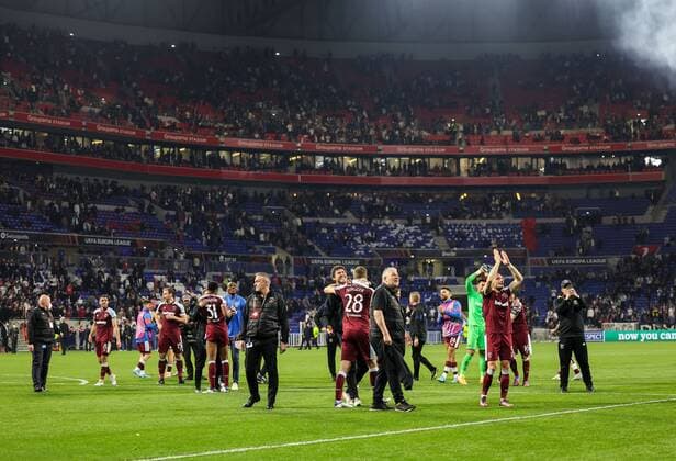 Mandatory Credit: Photo by Simon Dael Shutterstock (12893327do) West Ham United players celebrate at full time Olympique Lyonnais v West Ham United, UEFA Europa League, Quarter Final, Second Leg, Football, Groupama Stadium, Lyon, France - 14 Apr 2022 EDITORIAL USE ONLY No use with unauthorised audio, video, data, fixture lists, club league logos or live services. Online in-match use limited to 120 images, no video emulation. No use in betting, games or single club league player publications. Olympique Lyonnais v West Ham United, UEFA Europa League, Quarter Final, Second Leg, Football, Groupama Stadium, Lyon, France - 14 Apr 2022 EDITORIAL USE ONLY No use with unauthorised audio, video, data, fixture lists, club league logos or live services. Online in-match use limited to 120 images, no video emulation. No use in betting, games or single club league player publications. Copyright: xSimonxDael Shutterstockx 12893327do