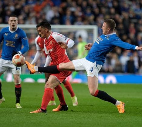 Ibrox Stadium, Glasgow, Scotland, April 14th 2022: Andr? Castro (Sporting Braga) and John Lundstram (Rangers) during the UEFA Europa League quarter final 2nd leg match between Glasgow Rangers and Sporting Braga at Ibrox Stadium in Glasgow, Scotland. UEFA Europa League quarter final 2nd leg Alex Todd SPP Glasgow Rangers v Sporting Braga 