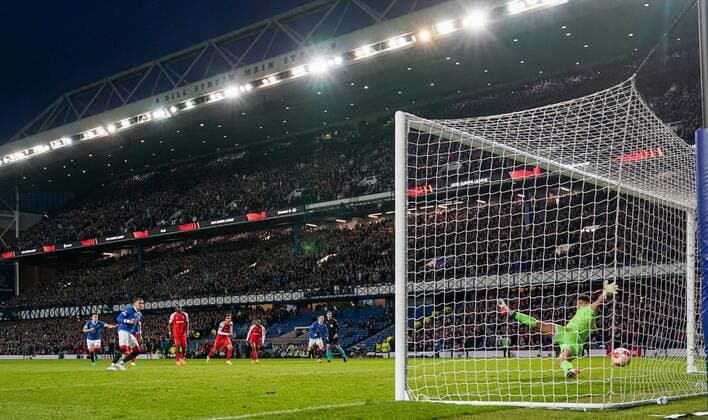 Mandatory Credit: Photo by Stuart Wallace Shutterstock (12893325bx) Rangers Captain James Tavernier beats SC Braga goalkeeper Matheus from the penalty spot to give Rangers a 1-0 lead (agg. 1-1). Rangers v Braga, UEFA Europa League, Quarter Final, Second Leg, Football, Ibrox Stadium, Glasgow, UK - 14 Apr 2022 EDITORIAL USE ONLY No use with unauthorised audio, video, data, fixture lists, club league logos or live services. Online in-match use limited to 120 images, no video emulation. No use in betting, games or single club league player publications. Rangers v Braga, UEFA Europa League, Quarter Final, Second Leg, Football, Ibrox Stadium, Glasgow, UK - 14 Apr 2022 EDITORIAL USE ONLY No use with unauthorised audio, video, data, fixture lists, club league logos or live services. Online in-match use limited to 120 images, no video emulation. No use in betting, games or single club league player publications. Copyright: xStuartxWallace Shutterstockx 12893325bx