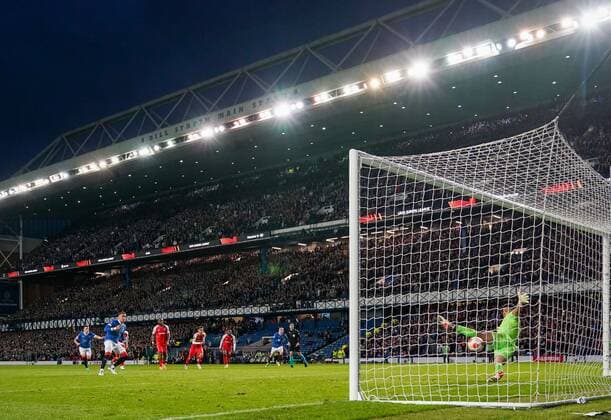 Mandatory Credit: Photo by Stuart Wallace Shutterstock (12893325ce) Rangers Captain James Tavernier beats SC Braga goalkeeper Matheus from the penalty spot to give Rangers a 2-0 lead (agg. 2-1). Rangers v Braga, UEFA Europa League, Quarter Final, Second Leg, Football, Ibrox Stadium, Glasgow, UK - 14 Apr 2022 EDITORIAL USE ONLY No use with unauthorised audio, video, data, fixture lists, club league logos or live services. Online in-match use limited to 120 images, no video emulation. No use in betting, games or single club league player publications. Rangers v Braga, UEFA Europa League, Quarter Final, Second Leg, Football, Ibrox Stadium, Glasgow, UK - 14 Apr 2022 EDITORIAL USE ONLY No use with unauthorised audio, video, data, fixture lists, club league logos or live services. Online in-match use limited to 120 images, no video emulation. No use in betting, games or single club league player publications. Copyright: xStuartxWallace Shutterstockx 12893325ce