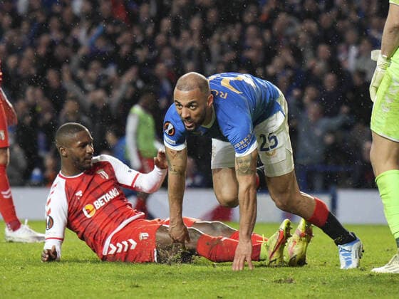 Mandatory Credit: Photo by Stuart Wallace Shutterstock (12893325cm) Kemar Roofe of Rangers leaves Andre Horta of SC Braga behind him & SC Braga goalkeeper Matheus, right, after scoring in extra time to give Rangers a 3-1 lead (agg. 3-2). Rangers v Braga, UEFA Europa League, Quarter Final, Second Leg, Football, Ibrox Stadium, Glasgow, UK - 14 Apr 2022 EDITORIAL USE ONLY No use with unauthorised audio, video, data, fixture lists, club league logos or live services. Online in-match use limited to 120 images, no video emulation. No use in betting, games or single club league player publications. Rangers v Braga, UEFA Europa League, Quarter Final, Second Leg, Football, Ibrox Stadium, Glasgow, UK - 14 Apr 2022 EDITORIAL USE ONLY No use with unauthorised audio, video, data, fixture lists, club league logos or live services. Online in-match use limited to 120 images, no video emulation. No use in betting, games or single club league player publications. Copyright: xStuartxWallace Shutterstockx 12893325cm