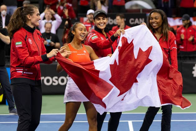 April 16, 2022, Vancouver, British Columbia, Canada: VANCOUVER, BRITISH COLUMBIA - APRIL 16: (L-R) REBECCA MARINO, LEYLAH ANNIE FERNANDEZ, Team Captain HEIDI EL TABAKH and FRANCOISE ABANDA celebrates after defeating DANIELA VISMANE of Latvia during the Billie Jean King Cup Qualifier singles tennis match at Pacific Coliseum in Vancouver, British Columbia, Canada. Vancouver Canada - ZUMAc132 20220416_zap_c132_021 Copyright: xAndrewxChinx