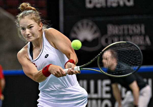 (220417) -- VANCOUVER, April 17, 2022 -- Team Latvia s Daniela Vismane returns the ball to Team Canada s Leylah Annie Fernandez during the Billie Jean King cup qualifiers between Canada and Latvia in Vancouver, Canada, on April 16, 2022. (Photo by Xinhua) (SP)CANADA-VANCOUVER-BILLIE JEAN KING CUP-CANADA VS LATVIA AndrewxSoong 