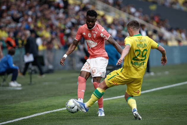 Abdoulaye Bamba (Angers SCO) vs Quentin Merlin (Nantes) FOOTBALL : FC Nantes vs Angers SCO - Ligue 1 Uberteat - 17 04 2022 AurelienMorissard Panoramic 