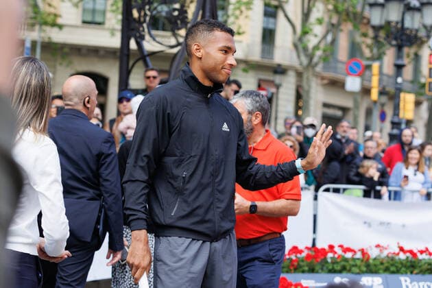 April 18, 2022, Barcelona, Barcelona, Spain: Felix Auger Aliassime during the photo oportunity exhibition between Carlos Alcaraz and Felix Auger Aliassime at Passeig de Gracia in Barcelona, Spain. Barcelona Spain - ZUMAd159 20220418_zia_d159_004 Copyright: xDavidxRamirezx