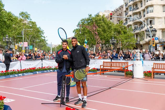April 18, 2022, Barcelona, Barcelona, Spain: Felix Auger Aliassime and Carlos Alcaraz during the photo oportunity exhibition between Carlos Alcaraz and Felix Auger Aliassime at Passeig de Gracia in Barcelona, Spain. Barcelona Spain - ZUMAd159 20220418_zia_d159_024 Copyright: xDavidxRamirezx