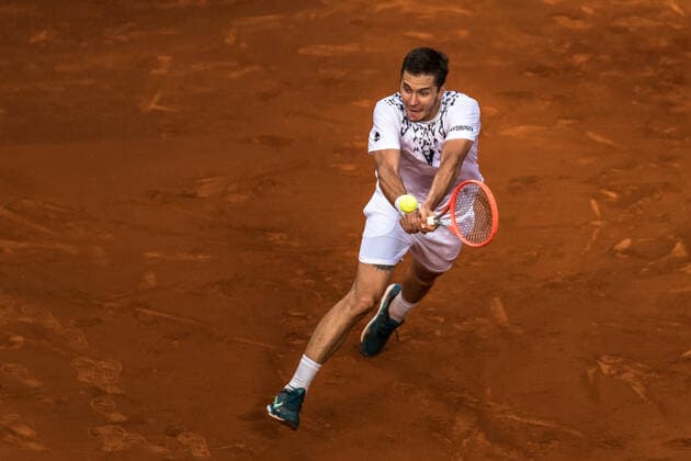 April 19, 2022, Barcelona, Catalonia, Spain: EGOR GERASIMOV (BLR) returns the ball to Cameron Norrie (GBR) during round 2 of the Barcelona Open Banc Sabadell 2022. Barcelona Spain - ZUMAo105 20220419_zap_o105_056 Copyright: xMatthiasxOesterlex