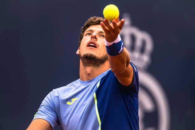 April 22, 2022, Barcelona, Catalonia, Spain: PABLO CARRENO BUSTA (ESP) serves Casper Ruud (NOR) against at Day 5 of the Barcelona Open Banc Sabadell 2022. Barcelona Spain - ZUMAo105 20220422_zap_o105_033 Copyright: xMatthiasxOesterlex