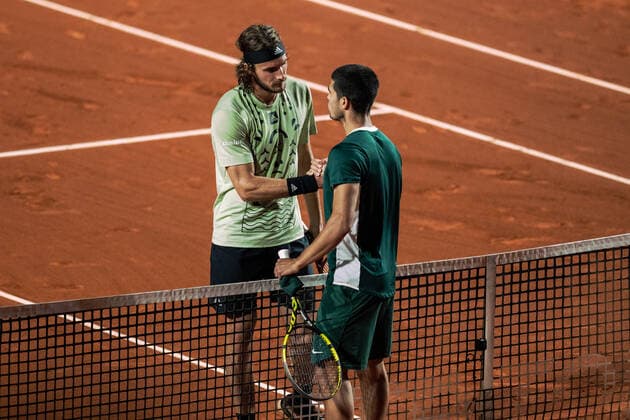 (220423) -- BARCELONA, April 23, 2022 -- Spain s Carlos Alcaraz (R) greets Greece s Stefanos Tsitsipas after the men s singles match against Greece s Stefanos Tsitsipas at Barcelona Open ATP, Tennis Herren 500 series tournament in Barcelona, Spain on April 22, 2022. (Photo by Joan Gosa Xinhua) (SP)SPAIN-BARCELONA-TENNIS-BARCELONA OPEN-MEN S SINGLES MengxDingbo 