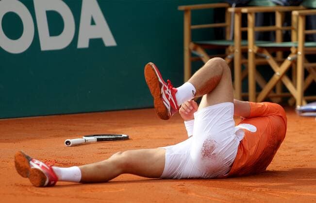 Serbia Tennis Open Djokovic - Rublev 8174655 24.04.2022 Serbia s Novak Djokovic falls during the final match against Russia s Andrey Rublev at the Serbia Open tennis tournament in Belgrade, Serbia. Alexandar Djorovich Sputnik Belgrade Serbia  Copyright: xAlexandarxDjorovichx