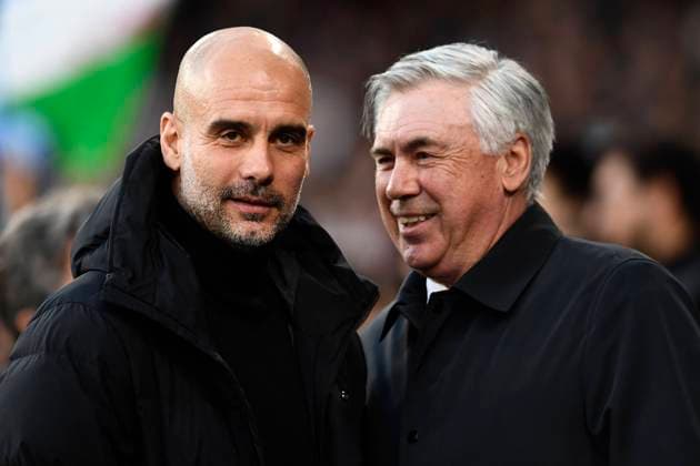 Sport Themen der Woche KW17 Sport Bilder des Tages Manchester City v Real Madrid Semi Final Leg One - UEFA Champions League Carlo Ancelotti head coach of Real Madrid and Pep Guardiola head coach of Manchester City greets each other during the UEFA Champions League Semi Final Leg One match between Manchester City and Real Madrid at City of Manchester Stadium on April 26, 2022 in Manchester, United Kingdom. Manchester England United Kingdom  Copyright: xJosexBretonx originalFilename:breton-manchest220426_nphMk.jpg