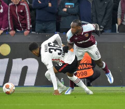 Mandatory Credit: Photo by Arfa Griffiths West Ham United Shutterstock (12914202ao) Michail Antonio of West Ham United in action with Ansgar Knauff of Eintracht Frankfurt West Ham United v Eintracht Frankfurt, UEFA Europa League, Semi-Final, First Leg, Football, The London Stadium, London, UK - 28 Apr 2022 EDITORIAL USE ONLY No use with unauthorised audio, video, data, fixture lists, club league logos or live services. Online in-match use limited to 120 images, no video emulation. No use in betting, games or single club league player publications. West Ham United v Eintracht Frankfurt, UEFA Europa League, Semi-Final, First Leg, Football, The London Stadium, London, UK - 28 Apr 2022 EDITORIAL USE ONLY No use with unauthorised audio, video, data, fixture lists, club league logos or live services. Online in-match use limited to 120 images, no video emulation. No use in betting, games or single club league player publications. Copyright: xArfaxGriffiths WestxHamxUnited Shutterstockx 12914202ao