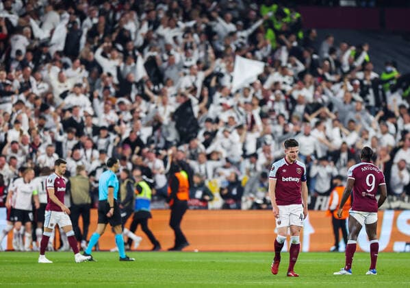 Mandatory Credit: Photo by Simon Dael Shutterstock (12914205cn) The West Ham United players look dejected after Daichi Kamada of Eintracht Frankfurt scores to make it 1-2 on the night West Ham United v Eintracht Frankfurt, UEFA Europa League, Semi-Final, First Leg, Football, The London Stadium, London, UK - 28 Apr 2022 EDITORIAL USE ONLY No use with unauthorised audio, video, data, fixture lists, club league logos or live services. Online in-match use limited to 120 images, no video emulation. No use in betting, games or single club league player publications. West Ham United v Eintracht Frankfurt, UEFA Europa League, Semi-Final, First Leg, Football, The London Stadium, London, UK - 28 Apr 2022 EDITORIAL USE ONLY No use with unauthorised audio, video, data, fixture lists, club league logos or live services. Online in-match use limited to 120 images, no video emulation. No use in betting, games or single club league player publications. Copyright: xSimonxDael Shutterstockx 12914205cn