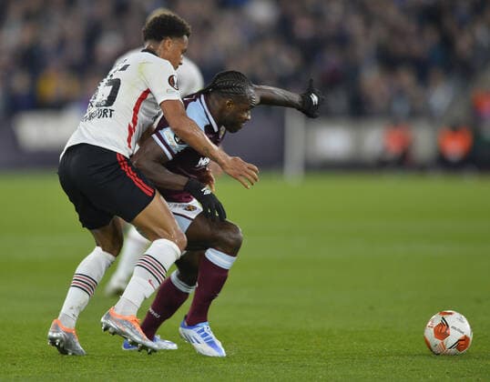 Mandatory Credit: Photo by James Griffiths West Ham United Shutterstock (12914199ax) Michail Antonio of West Ham United in action with Tuta of Eintracht Frankfurt West Ham United v Eintracht Frankfurt, UEFA Europa League, Semi-Final, First Leg, Football, The London Stadium, London, UK - 28 Apr 2022 EDITORIAL USE ONLY No use with unauthorised audio, video, data, fixture lists, club league logos or live services. Online in-match use limited to 120 images, no video emulation. No use in betting, games or single club league player publications. West Ham United v Eintracht Frankfurt, UEFA Europa League, Semi-Final, First Leg, Football, The London Stadium, London, UK - 28 Apr 2022 EDITORIAL USE ONLY No use with unauthorised audio, video, data, fixture lists, club league logos or live services. Online in-match use limited to 120 images, no video emulation. No use in betting, games or single club league player publications. Copyright: xJamesxGriffiths WestxHamxUnited Shutterstockx 12914199ax