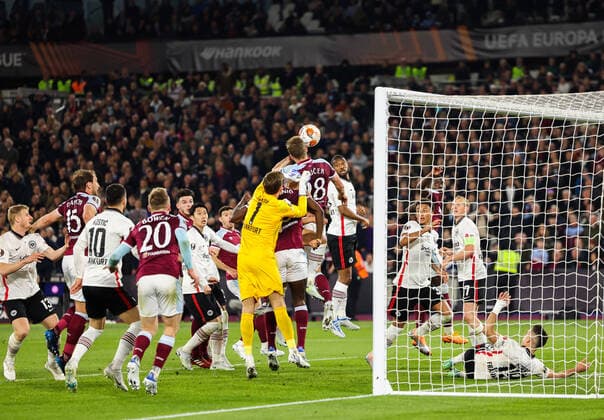 Mandatory Credit: Photo by Simon Dael Shutterstock (12914205dl) Tomas Soucek of West Ham United gets a late header on goal as Goalkeeper Kevin Trapp of Eintracht Frankfurt challenges West Ham United v Eintracht Frankfurt, UEFA Europa League, Semi-Final, First Leg, Football, The London Stadium, London, UK - 28 Apr 2022 EDITORIAL USE ONLY No use with unauthorised audio, video, data, fixture lists, club league logos or live services. Online in-match use limited to 120 images, no video emulation. No use in betting, games or single club league player publications. West Ham United v Eintracht Frankfurt, UEFA Europa League, Semi-Final, First Leg, Football, The London Stadium, London, UK - 28 Apr 2022 EDITORIAL USE ONLY No use with unauthorised audio, video, data, fixture lists, club league logos or live services. Online in-match use limited to 120 images, no video emulation. No use in betting, games or single club league player publications. Copyright: xSimonxDael Shutterstockx 12914205dl