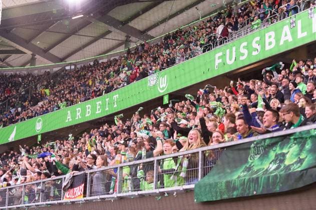 Wolfsburg, Germany, Apr 30th 2022: Fans of VfL Wolfsburg after their team scored the first goal during the UEFA Womens Champions League semifinall between VfL Wolfsburg and FC Barceloona at VW Arena in Wolfsburg, Germany. Sven Beyrich SPP VfL Wolfsburg v FC Barcelona, Barca - UEFA Womens Champions League - VW Arena 