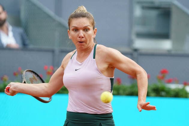 April 30, 2022, Madrid, Spain: Simona Halep of Romania plays against Paula Badosa of Spain in her second round match on Day 3 of the Mutua Madrid Open at La Caja Magica in Madrid..Simona Halep beats Paula Badosa (6.6) Madrid Spain - ZUMAs197 20220430_zaa_s197_120 Copyright: xAtilanoxGarciax