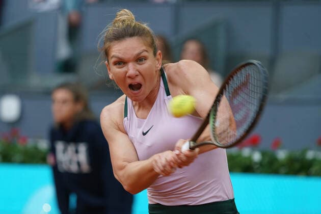 April 30, 2022, Madrid, Spain: Simona Halep of Romania plays against Paula Badosa of Spain in her second round match on Day 3 of the Mutua Madrid Open at La Caja Magica in Madrid..Simona Halep beats Paula Badosa (6.6) Madrid Spain - ZUMAs197 20220430_zaa_s197_125 Copyright: xAtilanoxGarciax