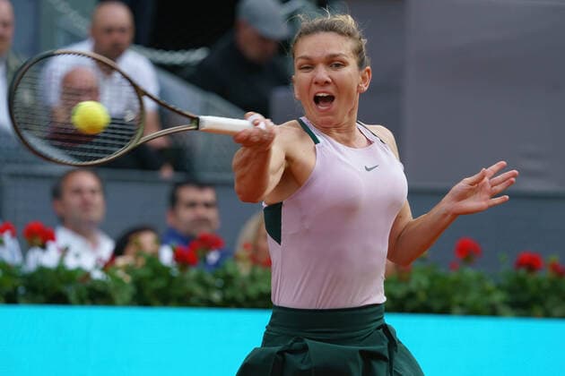 April 30, 2022, Madrid, Spain: Simona Halep of Romania plays against Paula Badosa of Spain in her second round match on Day 3 of the Mutua Madrid Open at La Caja Magica in Madrid..Simona Halep beats Paula Badosa (6.6) Madrid Spain - ZUMAs197 20220430_zaa_s197_131 Copyright: xAtilanoxGarciax