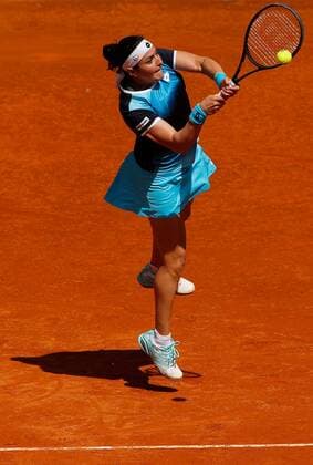 Mandatory Credit: Photo by Ella Ling Shutterstock (12922067h) Ons Jabeur of Tunisia in action Mutua Madrid Open, Tennis, La Caja Magica, Madrid, Spain - 04 May 2022 Mutua Madrid Open, Tennis, La Caja Magica, Madrid, Spain - 04 May 2022  Copyright: xEllaxLing Shutterstockx 12922067h