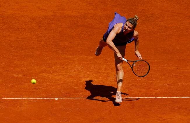 Mandatory Credit: Photo by Ella Ling Shutterstock (12922067f) Simona Halep of Romania in action Mutua Madrid Open, Tennis, La Caja Magica, Madrid, Spain - 04 May 2022 Mutua Madrid Open, Tennis, La Caja Magica, Madrid, Spain - 04 May 2022  Copyright: xEllaxLing Shutterstockx 12922067f