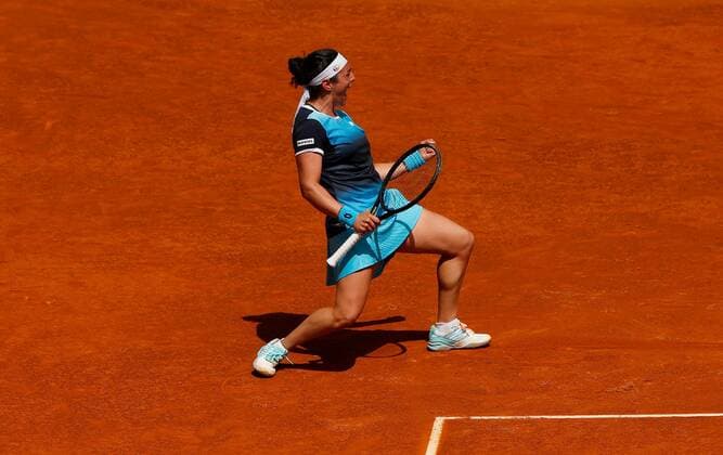 Mandatory Credit: Photo by Ella Ling Shutterstock (12922067a) Ons Jabeur of Tunisia celebrates Mutua Madrid Open, Tennis, La Caja Magica, Madrid, Spain - 04 May 2022 Mutua Madrid Open, Tennis, La Caja Magica, Madrid, Spain - 04 May 2022  Copyright: xEllaxLing Shutterstockx 12922067a