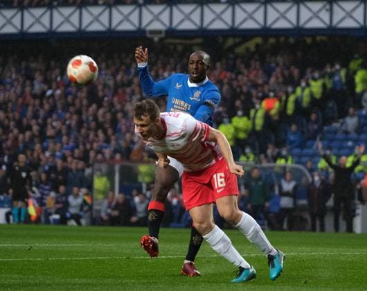 Ibrox Stadium, Glasgow, Scotland, May 5th 2022: Lukas Klostermann (RB Leipzig) heads clear from Glen Kamara (Rangers) during the UEFA Europa League semi final 2nd leg match between Glasgow Rangers and RB Leipzig at Ibrox Stadium in Glasgow, Scotland. UEFA Europa League semi final 2nd leg Alex Todd SPP Glasgow Rangers v RB Leipzig 