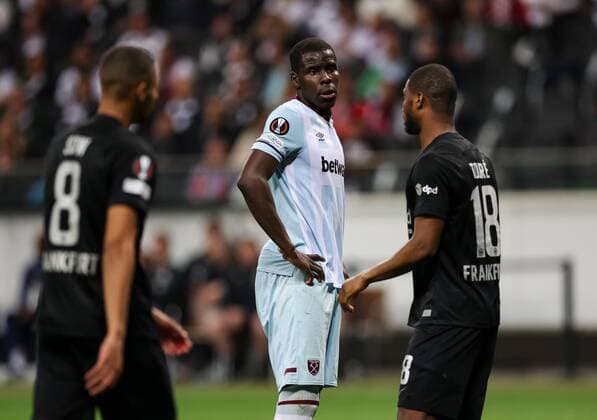 Mandatory Credit: Photo by Simon Dael Shutterstock (12925375dp) Kurt Zouma of West Ham United between Djibril Sow of Eintracht Frankfurt and Almamy Toure of Eintracht Frankfurt Eintracht Frankfurt v West Ham United, UEFA Europa League, Semi Final, Second Leg, Football, Deutsche Bank Park, Frankfurt, Germany - 05 May 2022 EDITORIAL USE ONLY No use with unauthorised audio, video, data, fixture lists, club league logos or live services. Online in-match use limited to 120 images, no video emulation. No use in betting, games or single club league player publications. Eintracht Frankfurt v West Ham United, UEFA Europa League, Semi Final, Second Leg, Football, Deutsche Bank Park, Frankfurt, Germany - 05 May 2022 EDITORIAL USE ONLY No use with unauthorised audio, video, data, fixture lists, club league logos or live services. Online in-match use limited to 120 images, no video emulation. No use in betting, games or single club league player publications. Copyright: xSimonxDael Shutterstockx 12925375dp