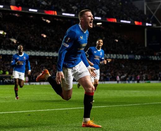 Mandatory Credit: Photo by Luke Nickerson Rangers FC Shutterstock (12926015bq) Rangers Midfielder John Lundstram celebrates scoring his sides third goal Rangers v RB Leipzig, UEFA Europa League, Semi Final, Second Leg, Football, Ibrox Stadium, Glasgow, UK - 05 May 2022 EDITORIAL USE ONLY No use with unauthorised audio, video, data, fixture lists, club league logos or live services. Online in-match use limited to 120 images, no video emulation. No use in betting, games or single club league player publications. Rangers v RB Leipzig, UEFA Europa League, Semi Final, Second Leg, Football, Ibrox Stadium, Glasgow, UK - 05 May 2022 EDITORIAL USE ONLY No use with unauthorised audio, video, data, fixture lists, club league logos or live services. Online in-match use limited to 120 images, no video emulation. No use in betting, games or single club league player publications. Copyright: xLukexNickerson RangersxFC Shutterstockx 12926015bq