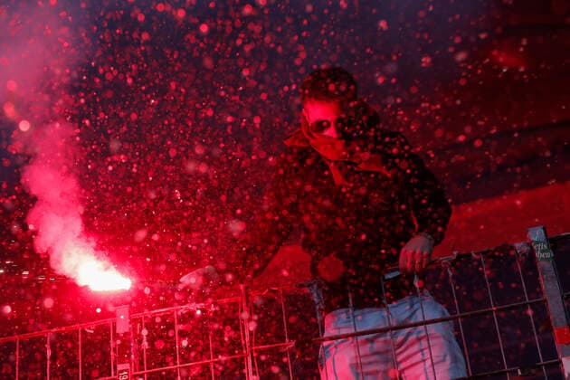 Eintracht Frankfurt v West Ham United UEFA Europa League A West Ham fan holds up a flare and another fan throws beer over him during the UEFA Europa League Semi-Final Second Leg match at the Deutsche Bank Park, Frankfurt Content Not Available For UK Newspapers Copyright: xPaulxChestertonx FIL-16873-0057 UK Newspapers OUT