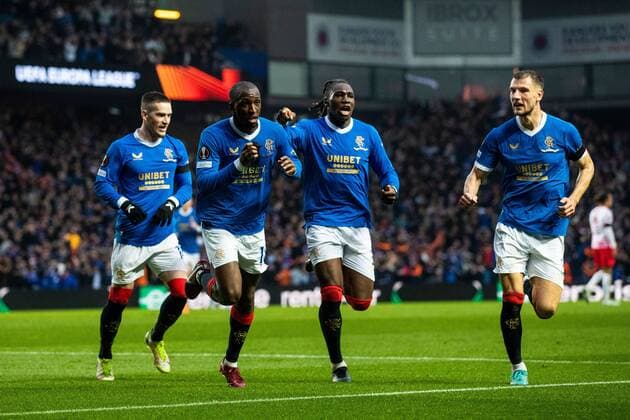 Mandatory Credit: Photo by Kirk O Rourke Rangers FC Shutterstock (12926021ev) Glen Kamara of Rangers celebrates his goal while kissing his black arm band in memory of kitman Jimmy Bell alongside Ryan Kent, Calvin Bassey and Borna Barisic during the Europa League Semi Final match against RB Leipzig at Ibrox Stadium, Glasgow. Rangers v RB Leipzig, UEFA Europa League, Semi Final, Second Leg, Football, Ibrox Stadium, Glasgow, UK - 05 May 2022 EDITORIAL USE ONLY No use with unauthorised audio, video, data, fixture lists, club league logos or live services. Online in-match use limited to 120 images, no video emulation. No use in betting, games or single club league player publications. Rangers v RB Leipzig, UEFA Europa League, Semi Final, Second Leg, Football, Ibrox Stadium, Glasgow, UK - 05 May 2022 EDITORIAL USE ONLY No use with unauthorised audio, video, data, fixture lists, club league logos or live services. Online in-match use limited to 120 images, no video emulation. No use in betting, games or single club league player publications. Copyright: xKirkxO Rourke RangersxFC Shutterstockx 12926021ev