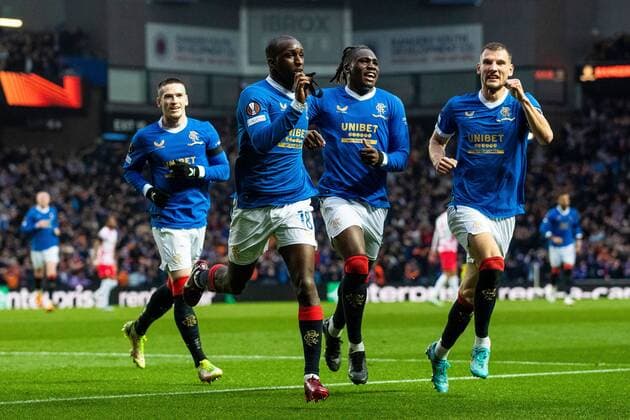 Mandatory Credit: Photo by Kirk O Rourke Rangers FC Shutterstock (12926021ex) Glen Kamara of Rangers celebrates his goal while kissing his black arm band in memory of kitman Jimmy Bell alongside Ryan Kent, Calvin Bassey and Borna Barisic during the Europa League Semi Final match against RB Leipzig at Ibrox Stadium, Glasgow. Rangers v RB Leipzig, UEFA Europa League, Semi Final, Second Leg, Football, Ibrox Stadium, Glasgow, UK - 05 May 2022 EDITORIAL USE ONLY No use with unauthorised audio, video, data, fixture lists, club league logos or live services. Online in-match use limited to 120 images, no video emulation. No use in betting, games or single club league player publications. Rangers v RB Leipzig, UEFA Europa League, Semi Final, Second Leg, Football, Ibrox Stadium, Glasgow, UK - 05 May 2022 EDITORIAL USE ONLY No use with unauthorised audio, video, data, fixture lists, club league logos or live services. Online in-match use limited to 120 images, no video emulation. No use in betting, games or single club league player publications. Copyright: xKirkxO Rourke RangersxFC Shutterstockx 12926021ex