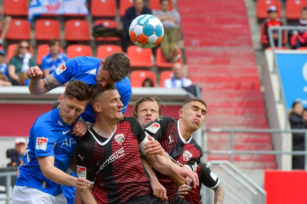 Bilder des Jahres 2022, Sport 05 Mai Sport Themen der Woche KW18 Stefan Kutschke (FC Ingolstadt, Nr.30) inmitten einer Spielerschar beim Spiel FC Ingolstadt 04 gegen Hansa Rostock am 07.05.2022, DFL regulations prohibit any use of photographs as image sequences and or quasi-video. GER, Fussball, 2. Bundesliga, Spieltag 33, FC Ingolstadt 04 gegen Hansa Rostock, 07.05.2022, Audi Sportpark Ingolstadt *** Stefan Kutschke FC Ingolstadt, Nr 30 in the middle of a crowd of players at the match FC Ingolstadt 04 vs Hansa Rostock on 07 05 2022, DFL regulations prohibit any use of photographs as image sequences and or quasi video GER, Fussball, 2 Bundesliga, Spieltag 33, FC Ingolstadt 04 vs Hansa Rostock, 07 05 2022, Audi Sportpark Ingolstadt Copyright: xStrischx Eibner-Pressefotox EP_osh