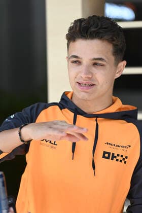 MIAMI GARDENS, FL - MAY 07: McLaren driver Lando Norris gestures in the paddock prior to a practice session for the Formula 1 CRYPTO.COM Miami Grand Prix on May 7, 2022 at Miami International Autodrome in Miami Gardens, FL. (Photo by Doug Murray Icon Sportswire)(Photo by Doug Murray Icon Sportswire) AUTO: MAY 07 F1 Crypto.com Miami Grand Prix Icon76220220507002