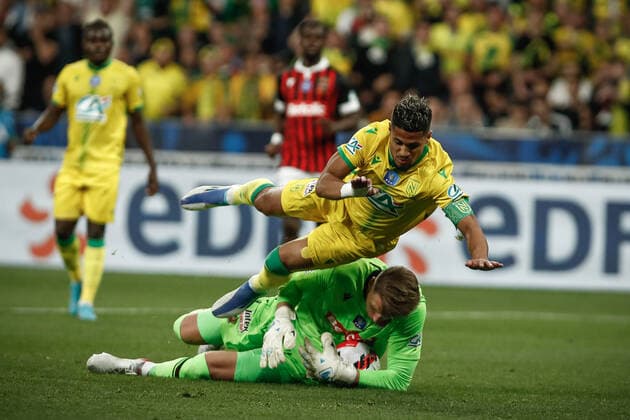 Ludovic Blas (Nantes) vs Marcin Bulka (Nice) FOOTBALL : Finale de la Coupe de France - OGC Nice vs FC Nantes - 07 05 2022 AurelienMorissard Panoramic 
