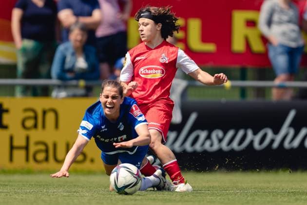 Willstaett, Germany, May 8th 2022: Marion Gavat (4 Sand) is fouled by Alicia Gudorf (12 Koeln) during the FLYERALARM Frauen-Bundesliga game between SC Sand and 1. FC Koeln at Adams Arena in Willstaett, Germany Dan O Connor SPP FLYERALARM Frauen-Bundesliga - SC Sand v 1. FC Koeln - Adams Arena 