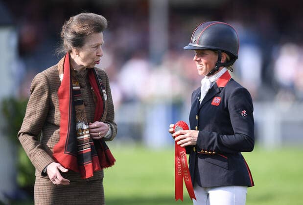 8th May 2022, Badminton Estate, Gloucestershire, England; Mars Equestrian Badminton Horse Trials, day 5; Rosalind Canter receives the runners up trophy from HRH Princess Anne after coming second on her horse Lordships Graffalo in Badminton Horse Trials 2022  ActionPlus12388139 SimonxWest Content restricted for UK based newspaper