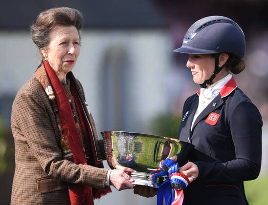 8th May 2022, Badminton Estate, Gloucestershire, England; Mars Equestrian Badminton Horse Trials, day 5; Laura Collett receives the Badminton Horse Trials 2022 winning trophy  ActionPlus12388142 SimonxWest Content restricted for UK based newspaper