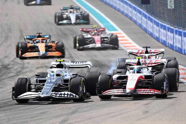 MIAMI GARDENS, FL - MAY 08: Scuderia AlphaTauri driver Yuki Tsunoda, left and Haas driver Mick Schumacher during the Formula 1 CRYPTO.COM Miami Grand Prix on May 8, 2022 at Miami Autodrome in Miami Gardens, FL. (Photo by Doug Murray Icon Sportswire) AUTO: MAY 08 F1 Crypto.com Miami Grand Prix Icon79620220508060