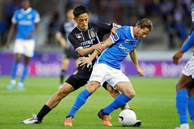 GENK, BELGIUM - MAY 10 : Morioka Ryota midfielder of Charleroi and Hrosovsky Patrik midfielder of KRC Genk during the Jupiler Pro League Europe Play-Off 2 match between Krc Genk and Sporting Charleroi on May 10, 2022 in Genk, Belgium, 10 05 2022 ( Krc Genk v Sporting Charleroi - Jupiler Pro League Europe Play-Off PhotoNews Panoramic 
